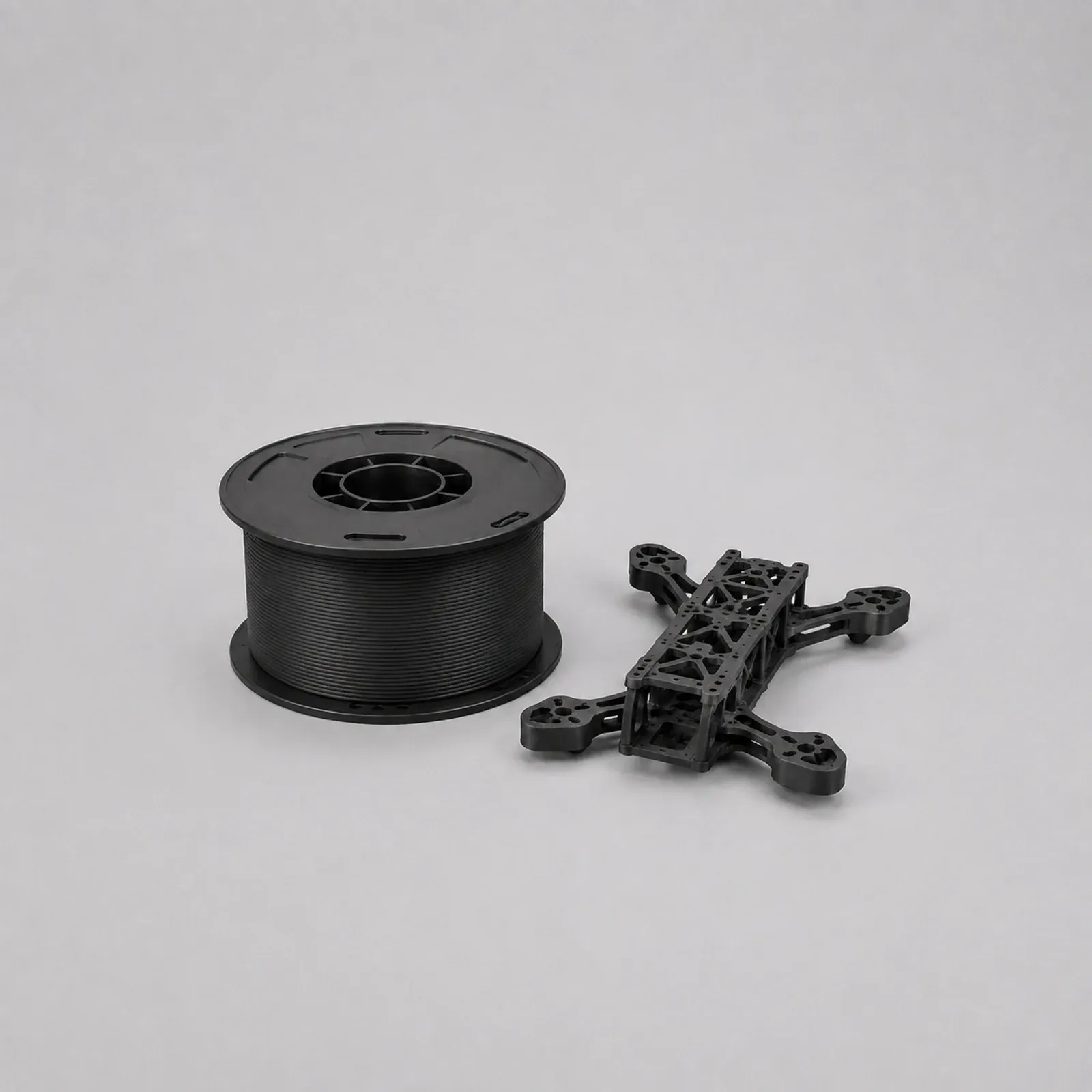 PLA-CF filament spool and printed reference part