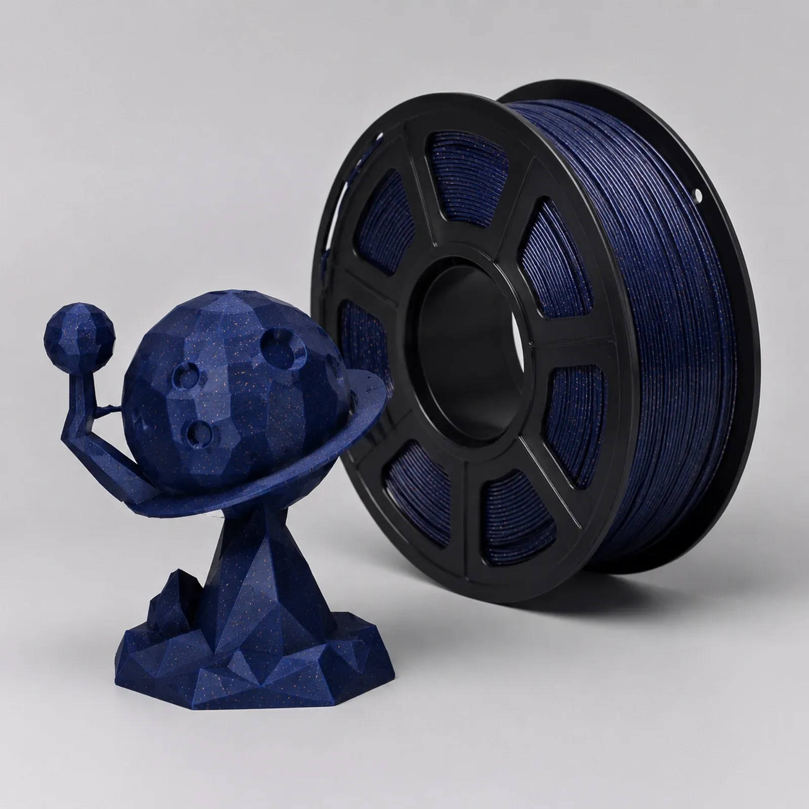 PLA Sparkle filament spool and printed reference part