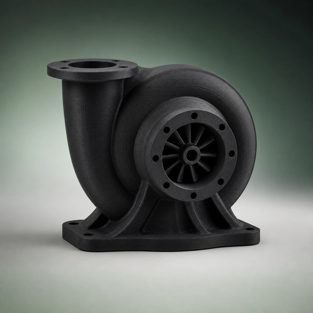 Black PAHT-CF: compact turbine-style housing with a volute passage and broad stable flange