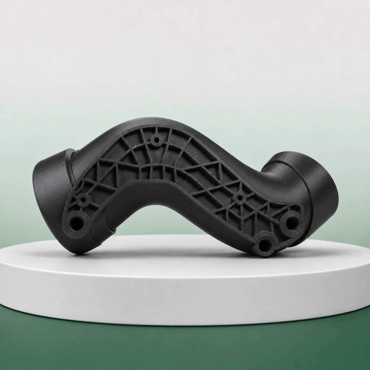 Black PAHT-CF: black PAHT-CF duct connector with its support-contact underside facing the camera on a turntable