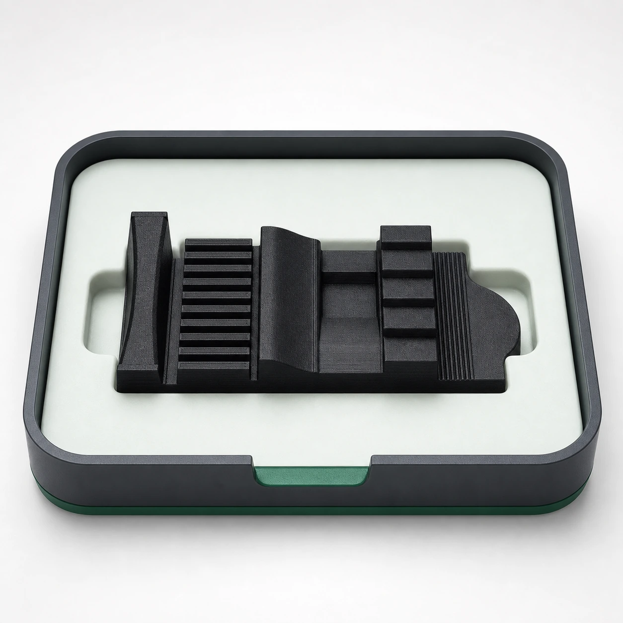 Black PAHT-CF: black PAHT-CF dimensional master coupon with smooth, ribbed and stepped surfaces in a reusable laboratory tray