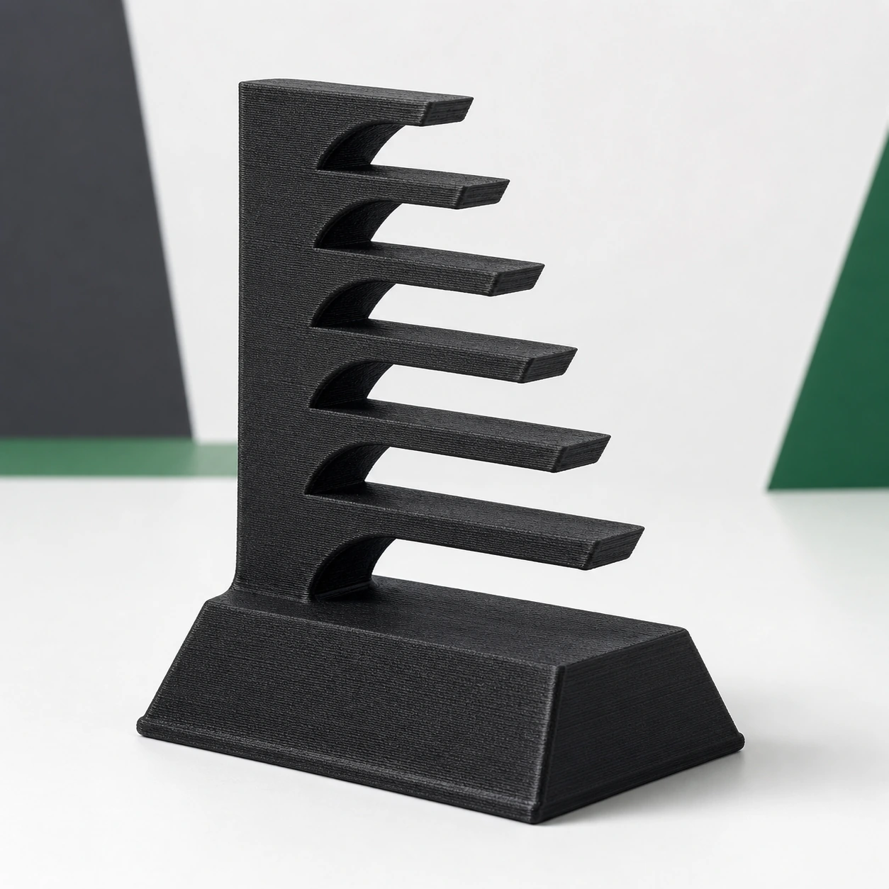 Black PAHT-CF: stepped overhang fan coupon with six clean unsupported angles and a wide base