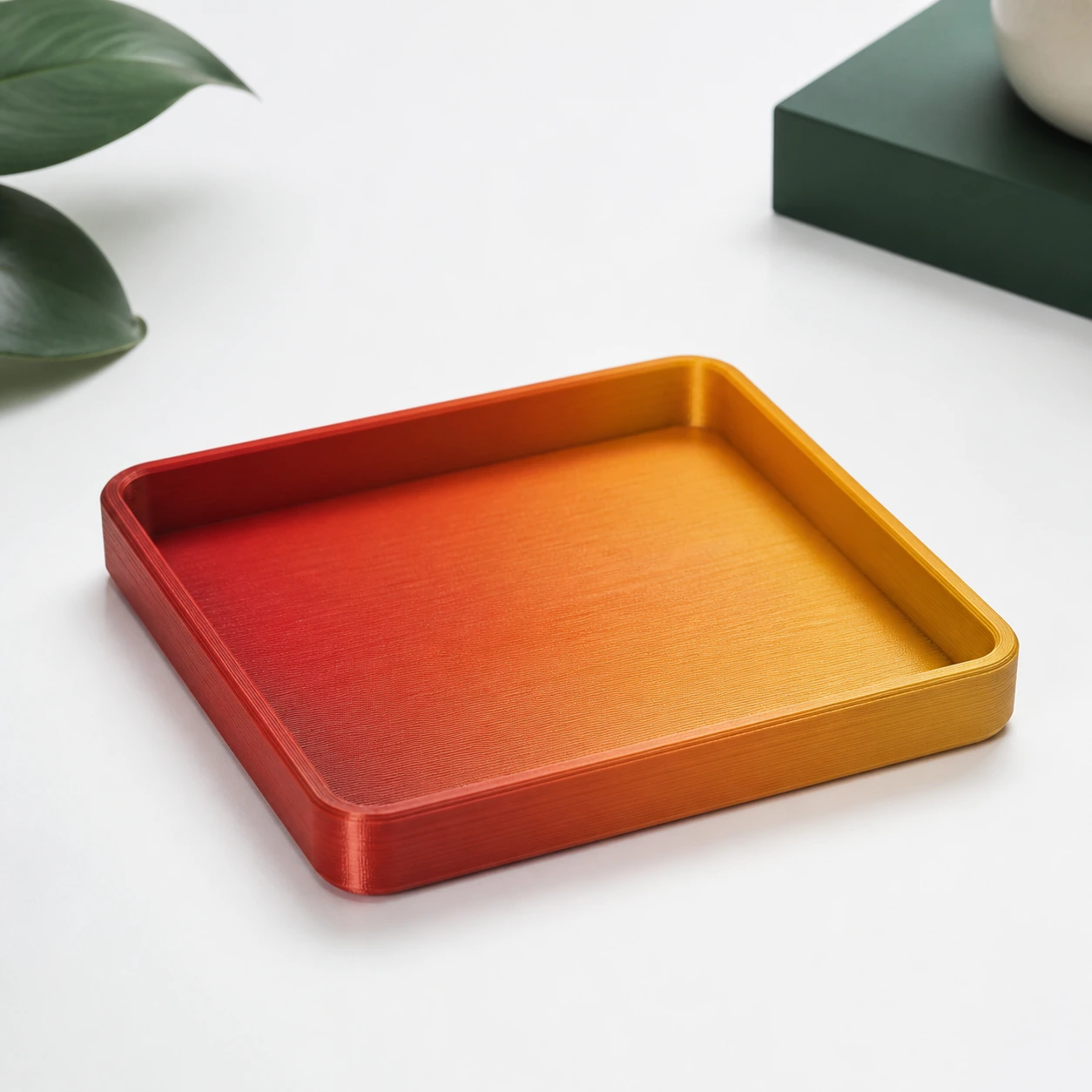 Gradient Silk Fire PLA Basic Gradient: shallow 3D-printed tray with broad flat top surfaces and raised rim