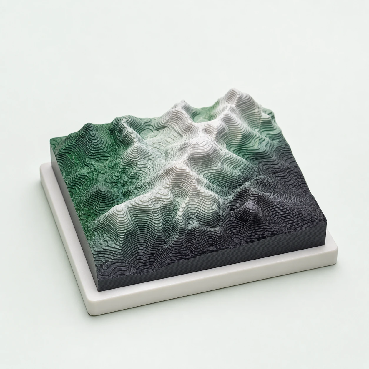 Gradient Silk Earth PLA Basic Gradient: raised topographic 3D-printed terrain tile on a clean base