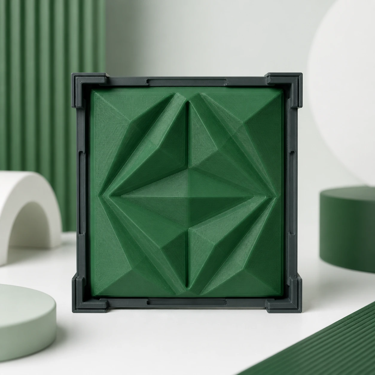 pine green PLA Tough+ complete unlettered geometric relief tile in a rigid rectangular carrier frame