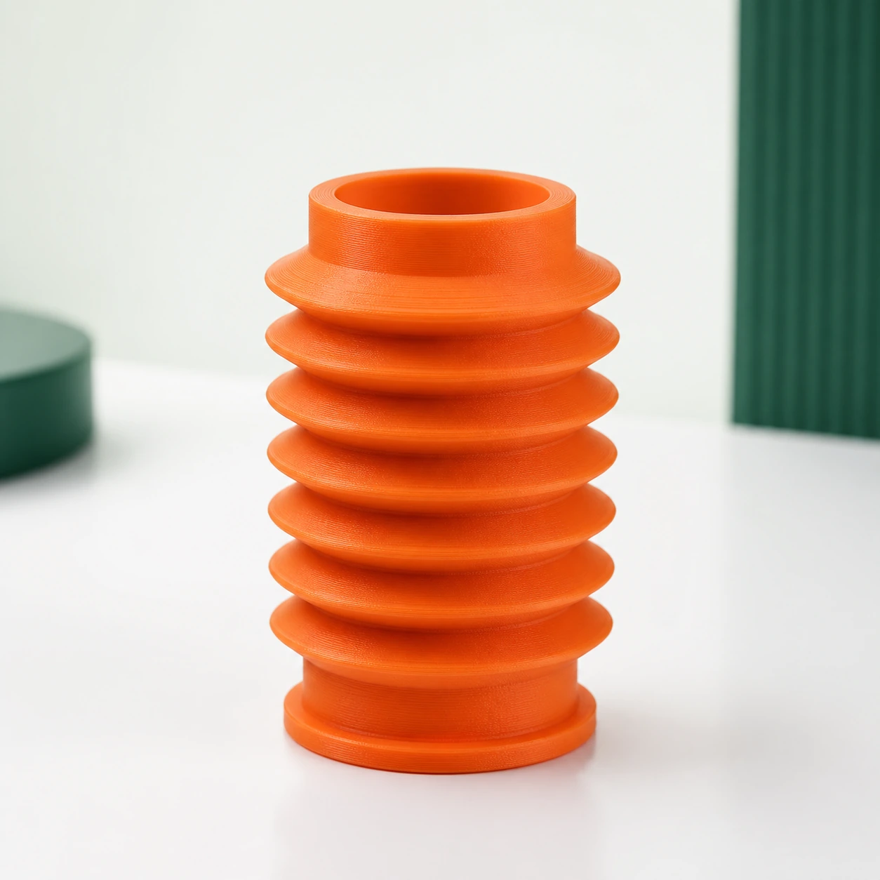 Lava Orange TPU Flexible 3D-printed flexible accordion dust boot for material reference