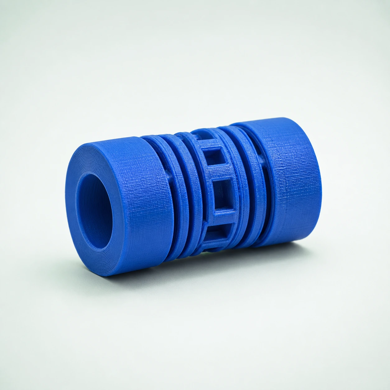 Sapphire Blue TPU Flexible FDM 3D printing of a flexible coupling for 3D-printing path reference