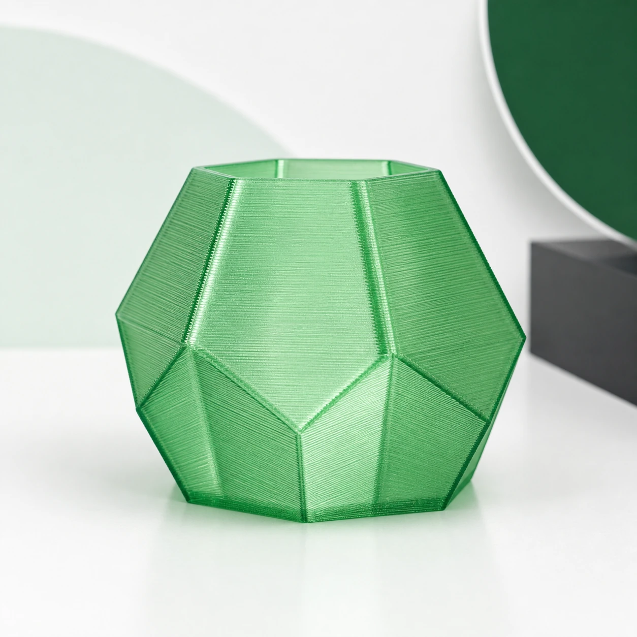 translucent green PLA Translucent faceted polygon shell showing changing layer direction