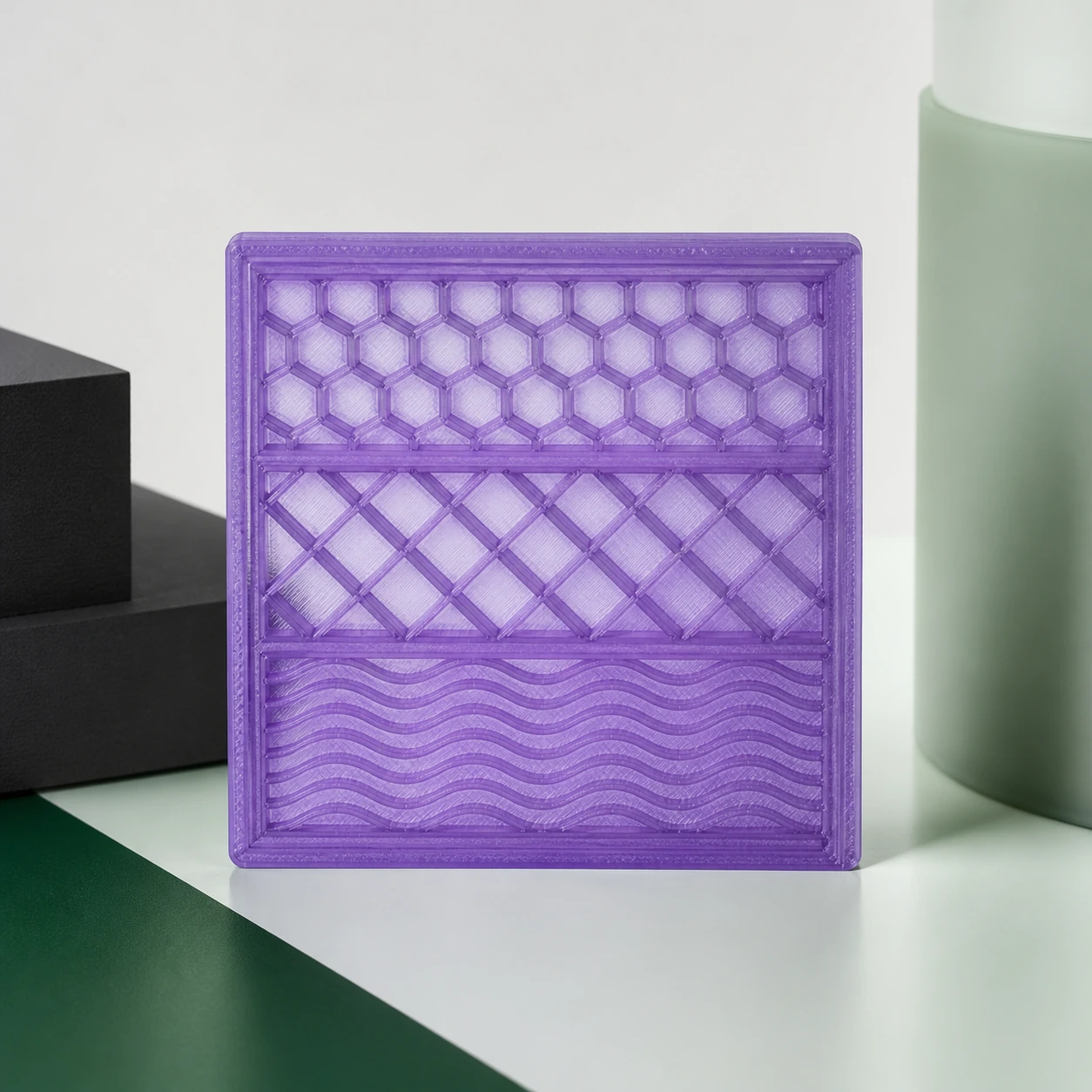 translucent violet PLA Translucent flat window tile showing three internal FDM infill patterns through the translucent walls